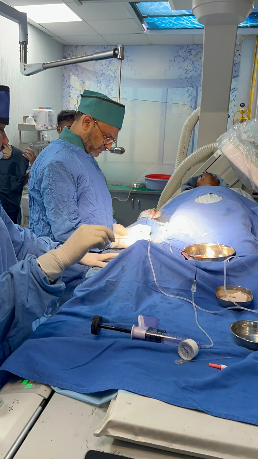 Interventional cardiologist performing a catheter procedure