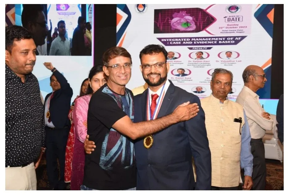 Colleagues congratulating Dr. Pavan Agrawal after the CSI Vidarbha ceremony